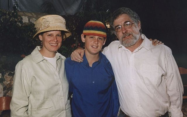 Seth and Sherri Mandell with Koby in the months before his death (photo credit: Courtesy the Mandell family)