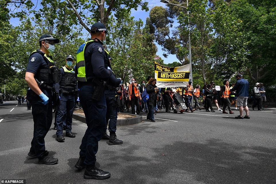 Police monitoring the demonstrators in Melbourne as the city was overrun by protesters