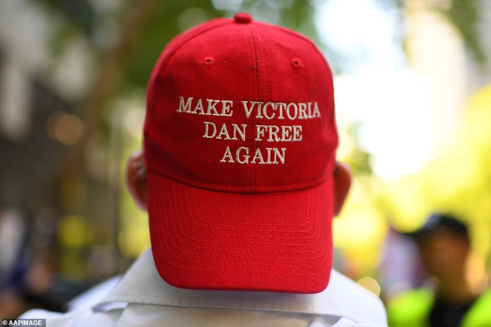 A protester was spotted wearing a 'Make Victoria Dan Free Again' hat similar to the one worn at Trump rallies in the US