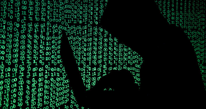 A hooded man holds a laptop computer as cyber code is projected on him in this illustration picture taken on May 13, 2017