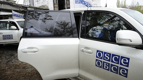 FILE PHOTO: Vehicles of the OSCE Special Monitoring Mission to Ukraine © 
Sergey Averin