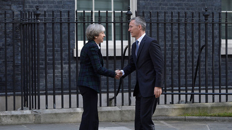 Britain's Prime Minister Theresa May greets NATO Secretary General Jens Stoltenberg outside 10 Downing Street in London, May 10, 2017. © Hannah Mckay