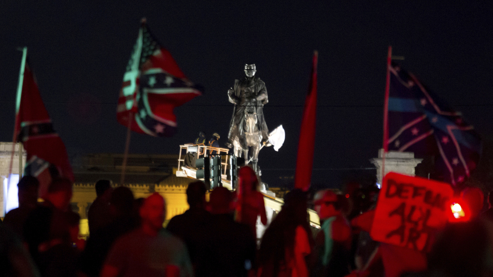 A statue of Confederate Gen. P.G.T. Beauregard is prepared for removal from the entrance to City Park in New Orleans, Tuesday, May 16, 2017.  (AP/Scott Threlkeld)