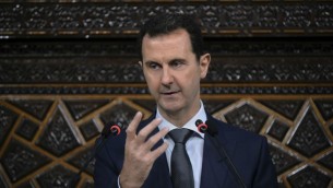 In this June 7, 2016 file photo released by the Syrian official news agency SANA, Syrian President Bashar Assad addresses the newly-elected parliament in Damascus, Syria. (SANA via AP)