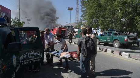 A victim is carried away on a stretcher at the site of a car bomb attack in Kabul on May 31, 2017. © Shah Marai 