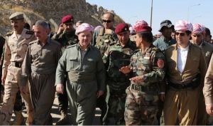 President Masoud Barzani and Peshmerga troops (archives)
