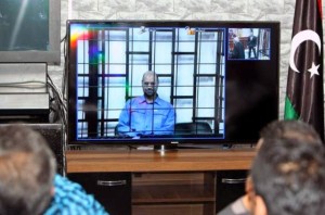 Saif attending a Tripoli court session via video link (2014 archives)