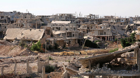 FILE PHOTO A general view shows damaged buildings in a rebel-held part of the southern city of Deraa, Syria © laa Al-Faqir