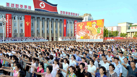 People participate in a Pyongyang city mass rally held at Kim Il Sung Square on August 9, 2017 © KCNA