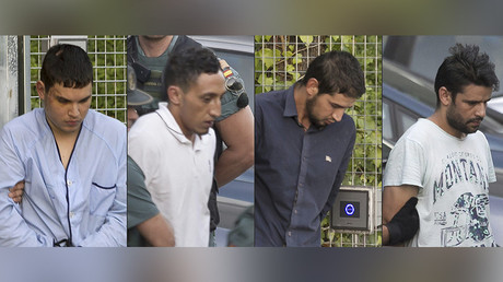 (From L) Mohamed Houli Chemlal, Driss Oukabir, Salah El Karib, and Mohamed Aallaa, suspected of involvement in the terror cell that carried out twin attacks in Barcelona and Cambrils, escorded by Spanish Civil Guards from a detention center in Tres Cantos, near Madrid, on August 22, 2017. © AFP