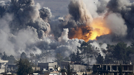 FILE PHOTO: Smoke rises over Syrian town of Kobani after an airstrike. A U.S.-led military coalition has been bombing Islamic State © Kai Pfaffenbach