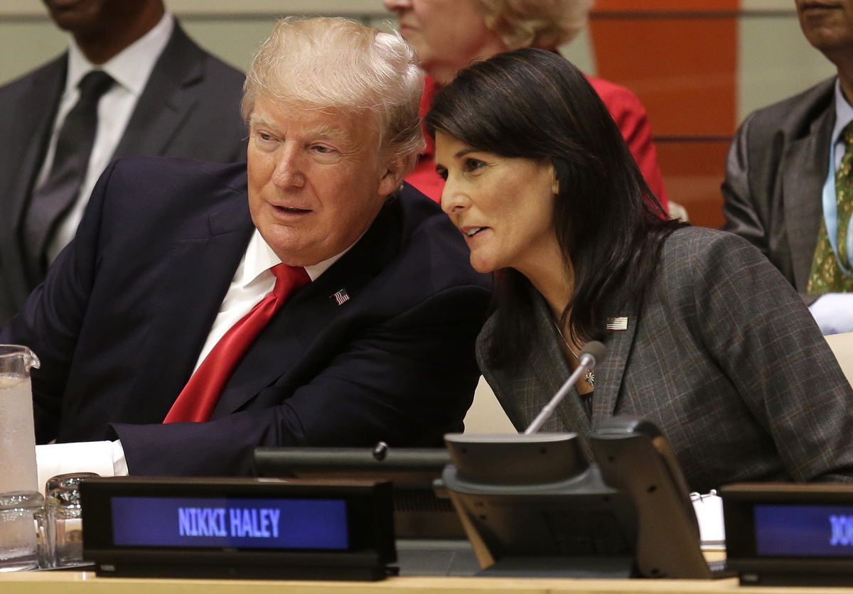 United States President Donald Trump speaks with U.S. Ambassador to the United Nations Nikki Haley before a meeting during the United Nations General Assembly at U.N. headquarters, Monday, Sept. 18, 2017. (AP/Seth Wenig)