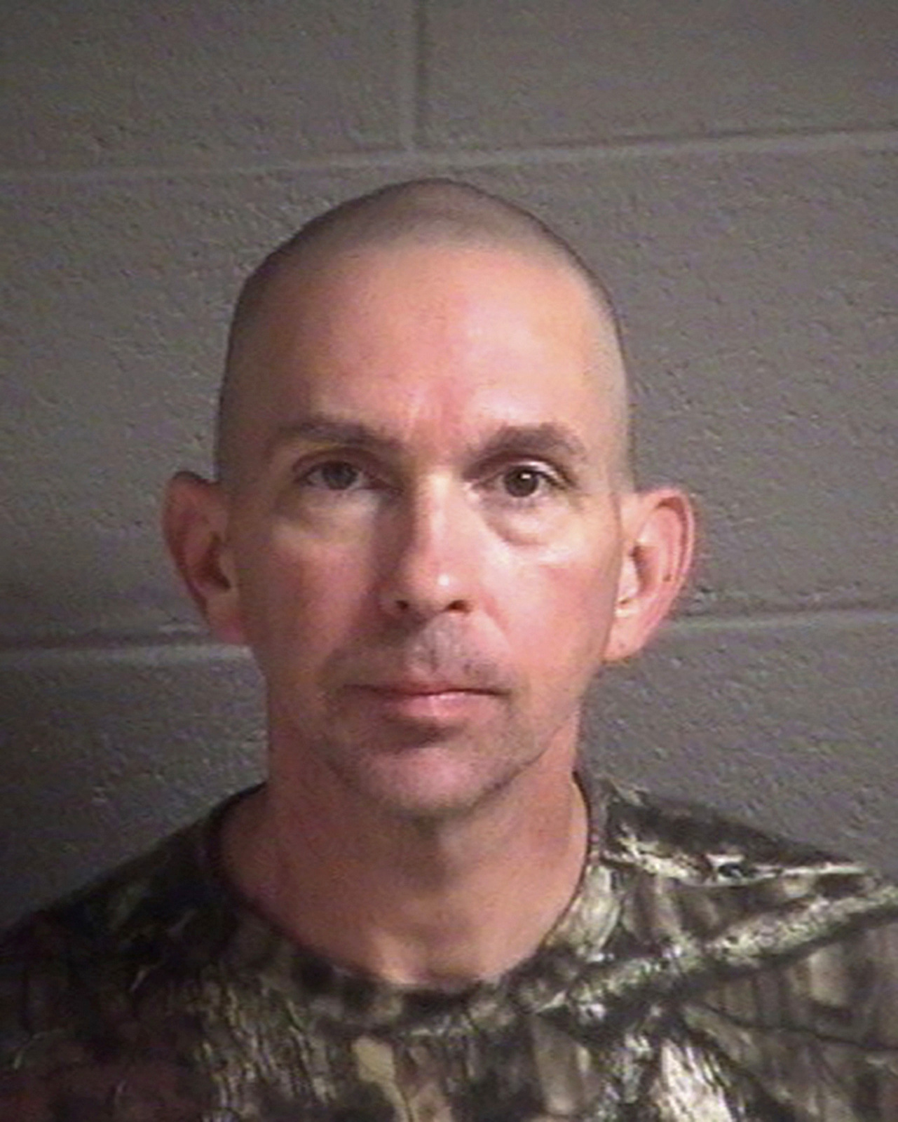Michael Christopher Estes, who’s accused of planting an improvised explosive device at the airport on Friday, Oct. 6, 2017, in Asheville, N.C. A criminal complaint in federal court accuses Estes of attempted malicious use of explosive materials and unlawful possession of explosives at the airport. (Buncombe County Detention Center via AP)