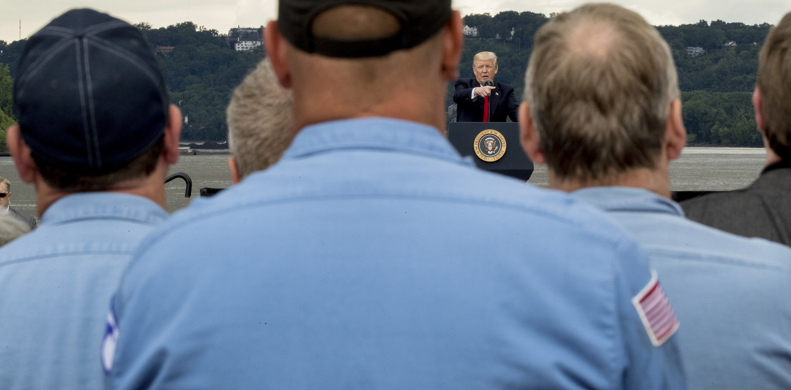 Workers listen as President Donald Trump, top center, speaks about infrastructure at Rivertowne Marina in Cincinnati, Ohio, June 7, 2017. (AP/Andrew Harnik)