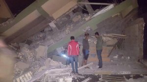 Collapsed building in Sulaymaniya in Iraq's Kurdistan Autonomous Region. Aftershocks make it extremely dangerous for search and rescue workers to enter damaged structures. 