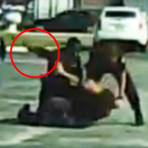 Cop Pounds Woman in the Head and Slams Her Face Into Concrete