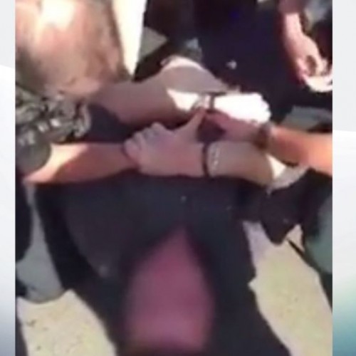 Video Shows UK Police Punching Handcuffed Man In Face