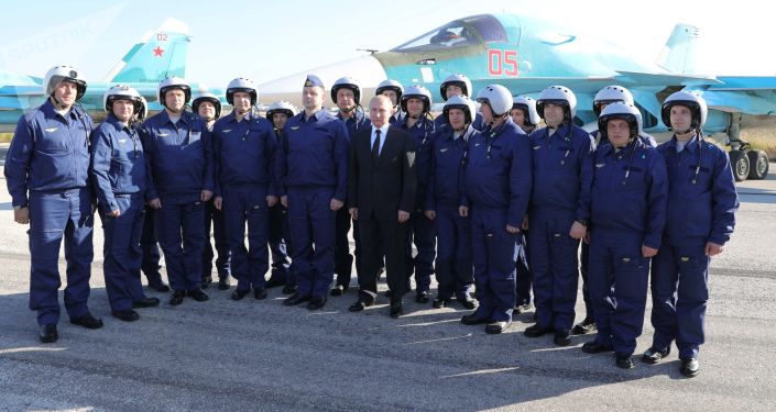 Russian President Vladimir Putin visits the Hmeymim Airbase in Syria on December 11, 2017