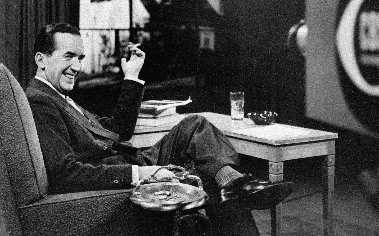 CBS News broadcaster Edward R. Murrow smokes a cigarette on a CBS set. (AP Photo)