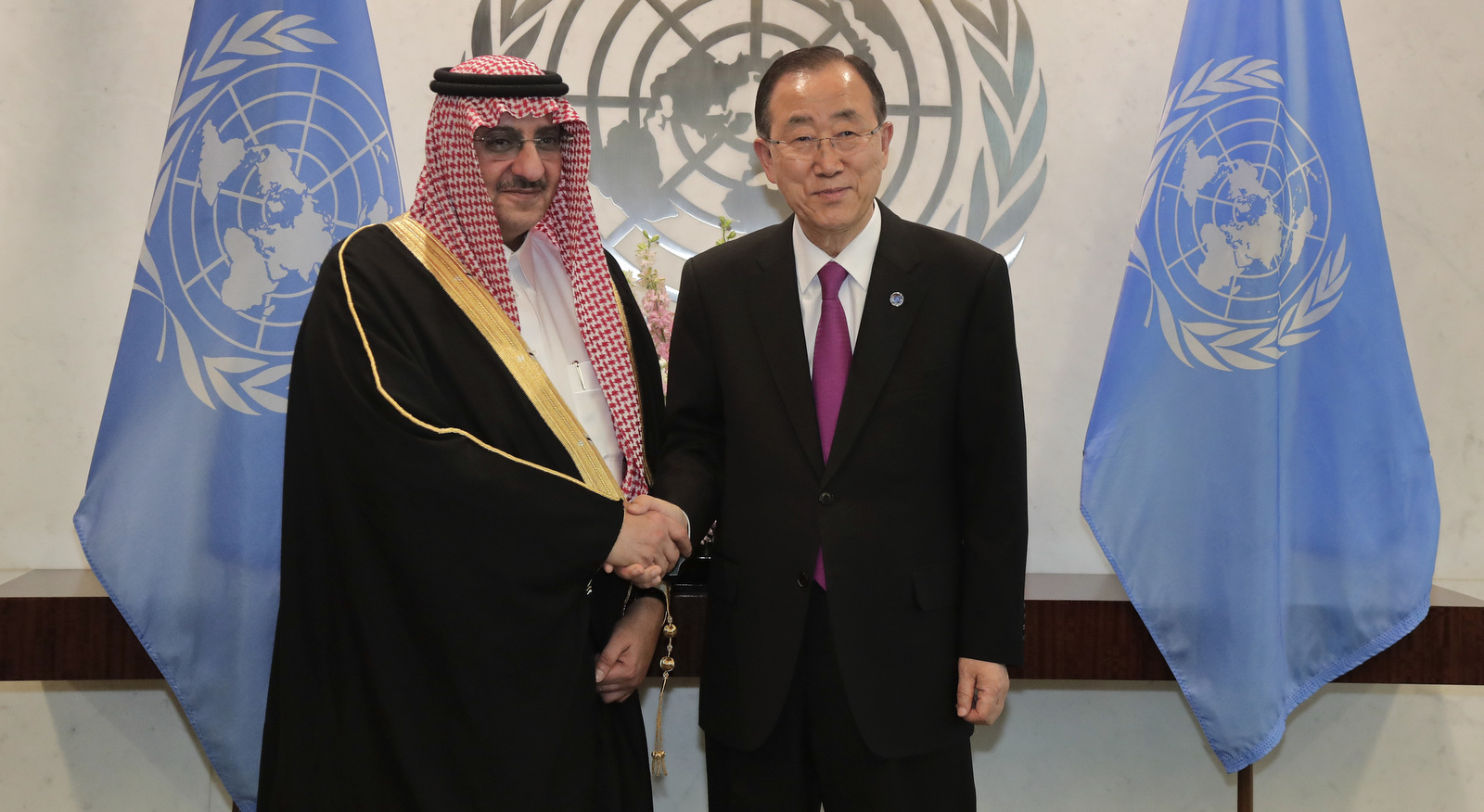 United Nations Secretary-General Ban Ki-moon, right, poses for a photo with Prince Mohammad Bin Naif Bin Abdulaziz Al-Saud, deputy prime minister of Saudi Arabia, Monday, Sept. 19, 2016, at U.N. headquarters. (AP/Julie Jacobson)
