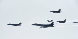 U.S. Air Force B-1B Lancer bombers, left and second from left, fly with South Korean and U.S. fighter jets over the Korean Peninsula, South Korea, July 8, 2017, in this photo provided by South Korean Defense Ministry. 