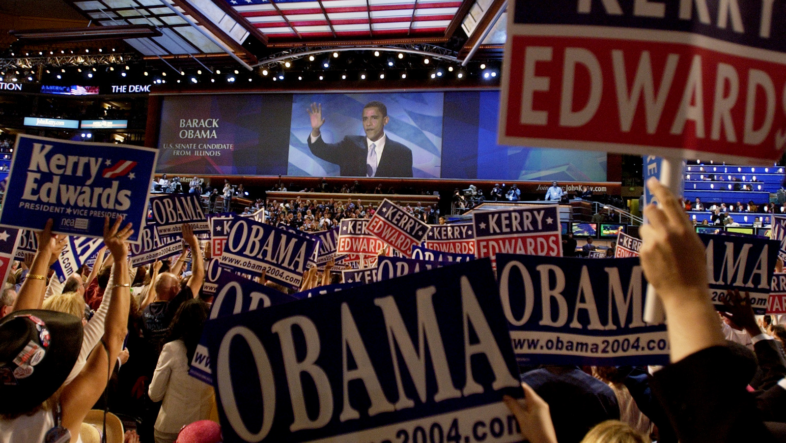 Delegates cheer as keynote speaker Barack Obama, candidate for the Senate from Illinois, speaks during the Democratic National Convention at the FleetCenter in Boston, July 27, 2004. (AP/Laura Rauch)