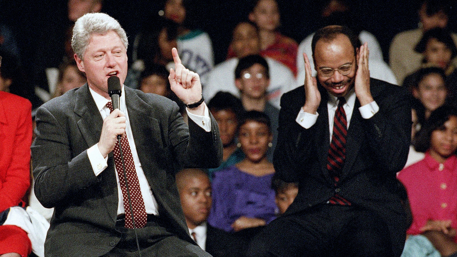 U.S. Rep. Mel Reynolds (D-Ill.) and President Bill Clinton answer questions posed by a student at suburban Hillcrest High School in Country Club Hills, Ill., Feb. 28, 1994. (AP/Tim Boyle)