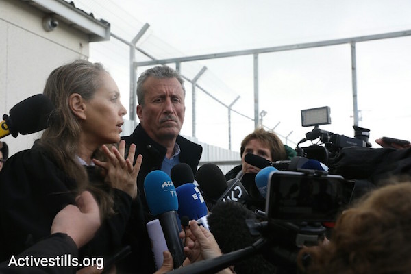 Gaby Lasky, Ahed Tamimi's attorney, and Bassem Tamimi, Ahed's father, outside of the Ofer military prison. February 13, 2018. (Oren Ziv/Activestills.org)
