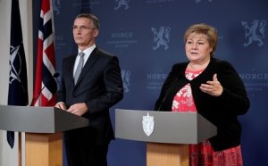 NATO Secretary-General Jens Stoltenberg and Norwegian PM Erna Solberg speak at a press conference on Monday. Photo: Torbjorn Kjosvold | Norwegian Armed Forces 