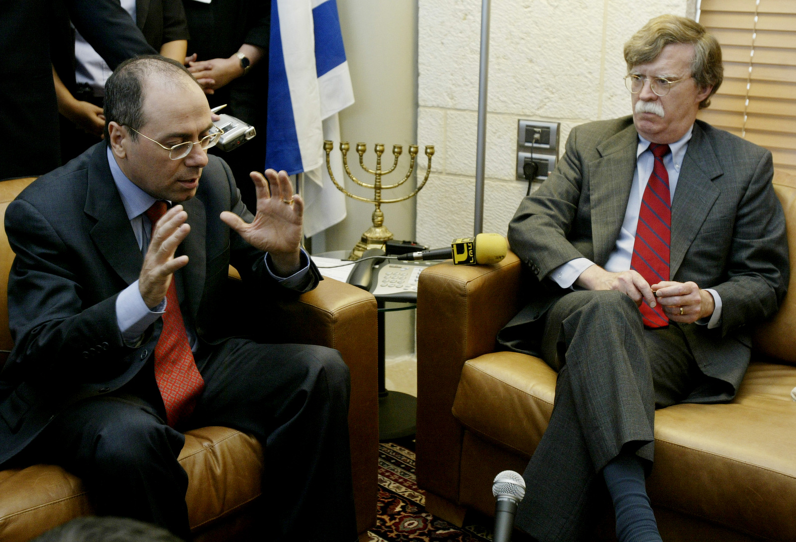 John R. Bolton meets with the Israeli Foreign Minister in Jerusalem in 2004 about U.N. sanctions against Iran over its alleged quest for nuclear weapons. (AP/Oded Balilty)