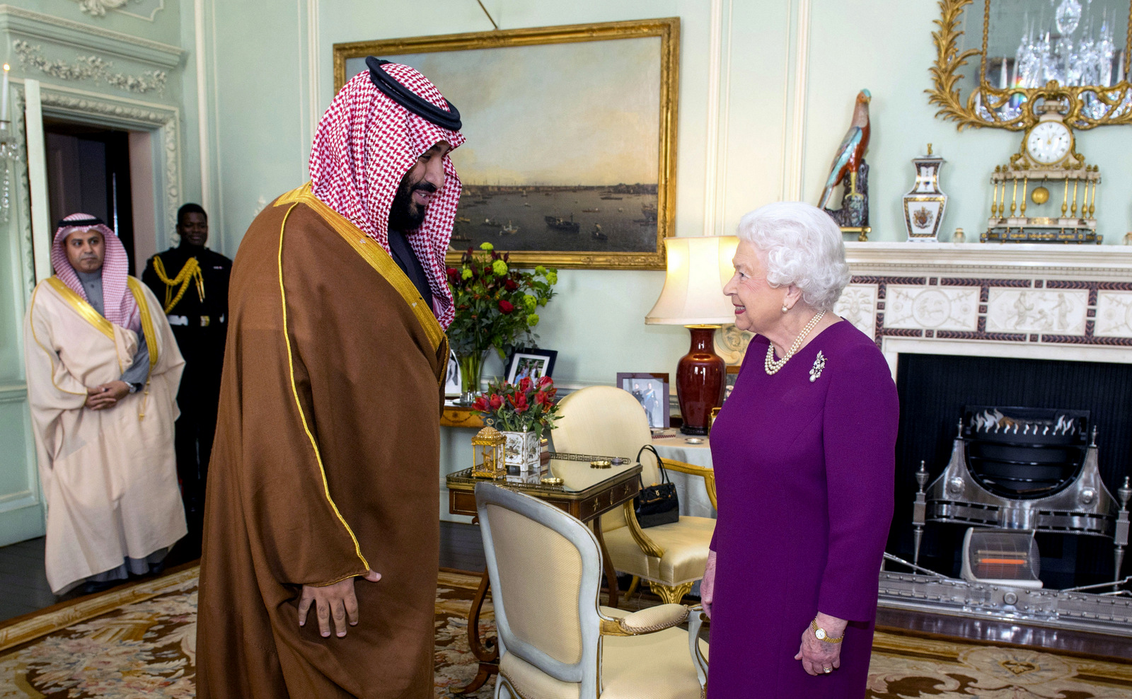 Britain's Queen Elizabeth II greets the Crown Prince of Saudi Arabia Mohammed bin Salman, during a private audience at Buckingham Palace in London, March 7, 2018. (Dominic Lipinski/AP)