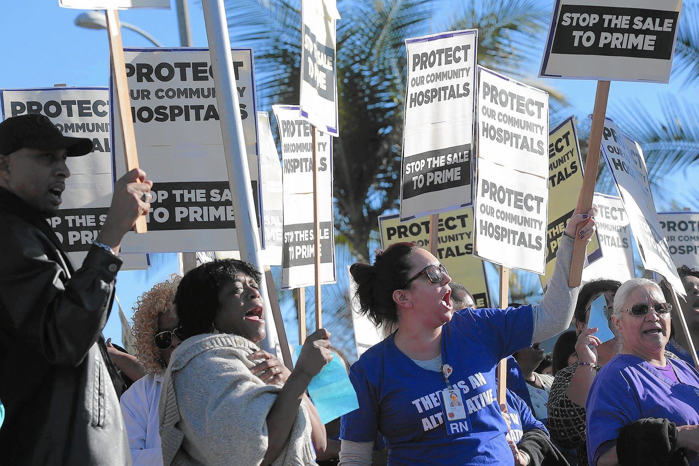 Protesters opposed to the sale of community hospitals run by the Catholic order Daughters of Charity to Prime Healthcare demonstrate outside a hearing held by the California attorney Kamala Harris. (Photo: Los Angeles Times) (RoseAnn DeMoro)