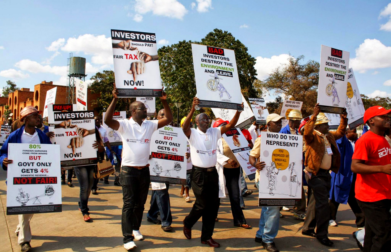Zambians protest against the unfair tax system employed by multinational companies, such as Glencore, in place across Africa. (Photo: Demotix)
