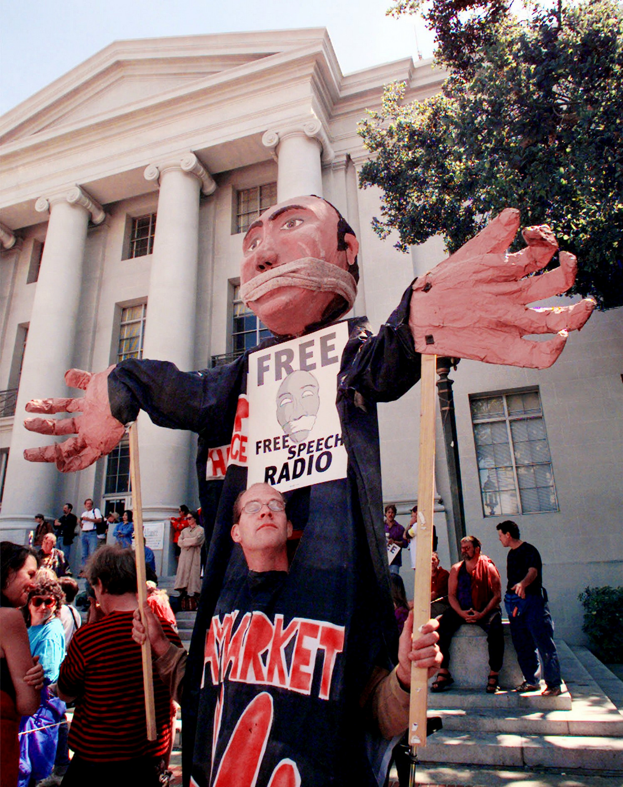 A rally at University of California at Berkeley over keeping local control of KPFA, owned by the Pacifica Foundation, which syndicates Democracy Now! (AP/Paul Sakuma)