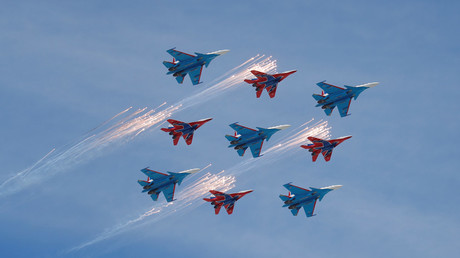 Russian MiG-29 jet fighters of the Strizhi and Su-30 jet fighters of the Russkiye Vityazi aerobatic teams fly in formation during the V-Day celebrations at Red Square in Moscow, Russia on May 9, 2018. © Maxim Shemetov
