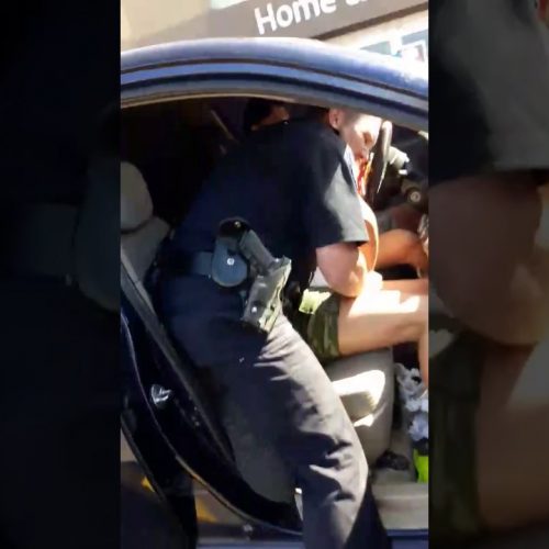 WATCH: Phoenix Police Officer Violently Arrests Woman in Walmart Parking Lot
