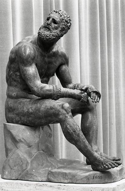 Wrestling and boxing were valued sports during the ancient Olympic games. The bronze Boxer at Rest or the Boxer of the Quirinal, is a Hellenistic Greek sculpture of a nude resting boxer excavated in Rome. (Paolo Monti / CC BY-SA 4.0)