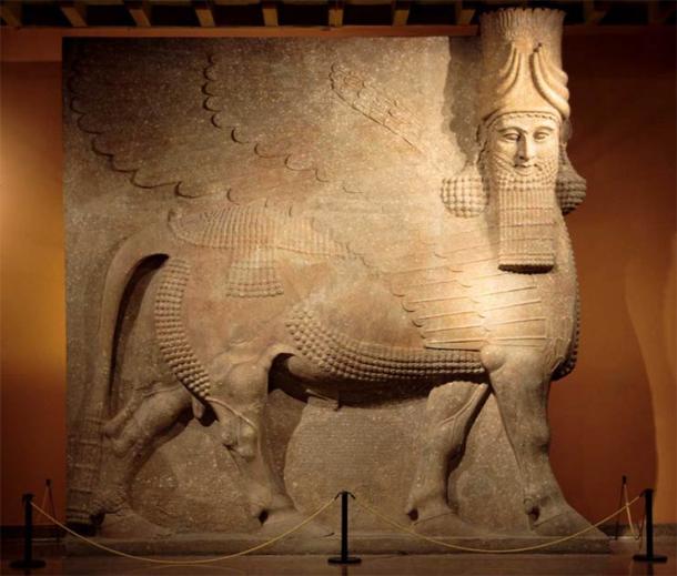 This protective spirit known as a lamassu is a composite being with the head of a human, the body and ears of a bull, and the wings of a bird. (Trjames / CC BY-SA 3.0)