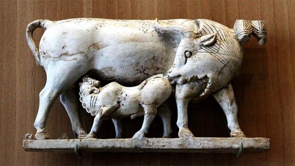 One of the famous ivories of Arslan Tash depicting a cow suckling its calf, a spoil of war taken from the palaces of the Aramaic and Phoenician princes during the conquests of the Assyrian rulers. This popular ancient theme is interpreted as a form of divine symbolism. (Claude Valette / CC BY-SA 2.0)