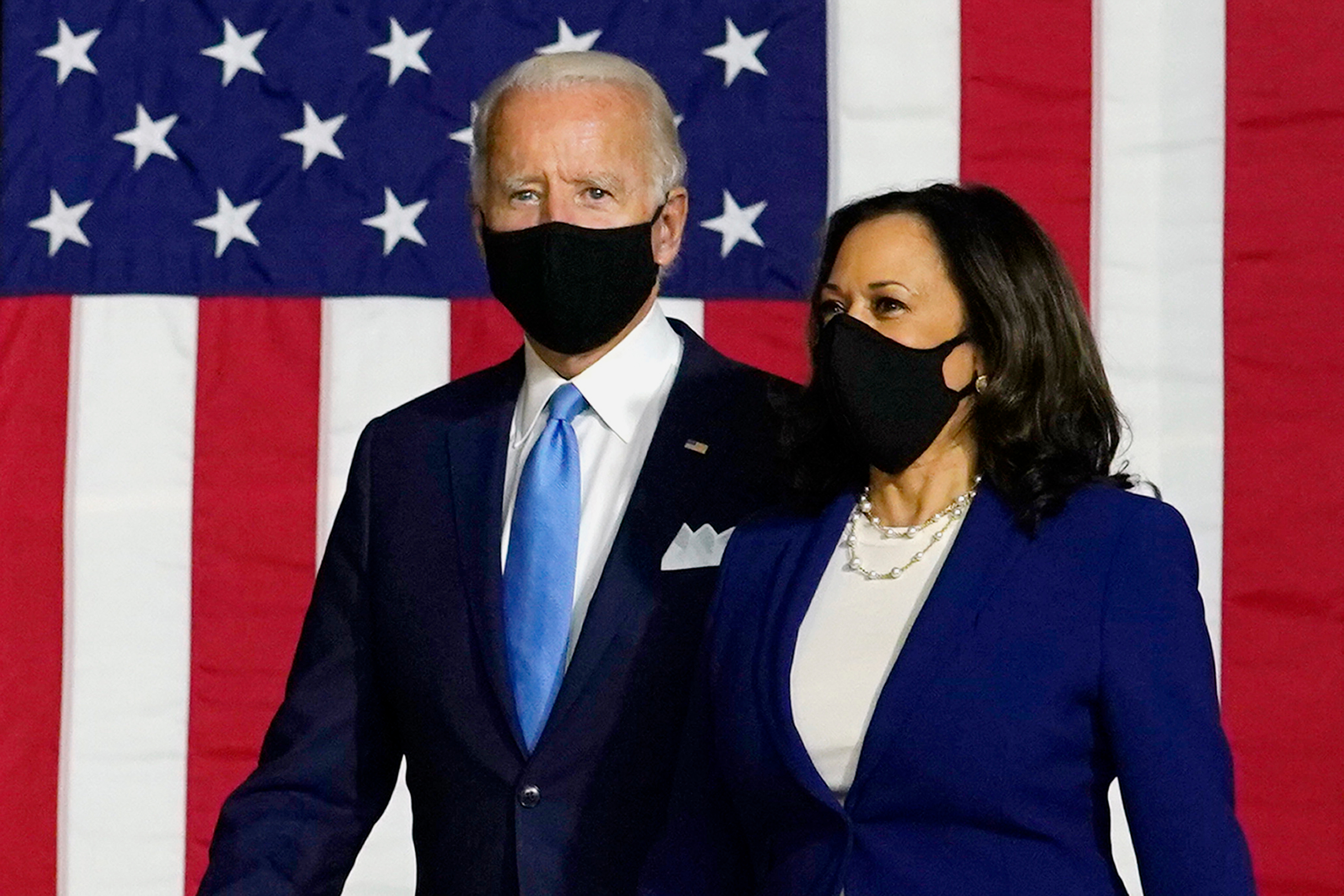 Joe Biden and Kamala Harris arrive at a news conference in Wilmington, Delaware on August 12, 2020. Trump also unleashed on Biden and Harris