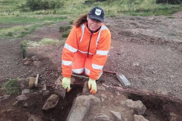 An archaeologist at work unearthing the ancient Edinburgh hillfort recently uncovered on Arthur’s Seat, in the heart of the Scottish capital city