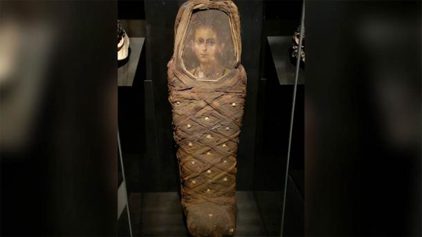 The Egyptian boy’s mummy coffin and mummy portrait. (Nerlich AG, et al. PLOS One (2020) / CC BY 4.0)