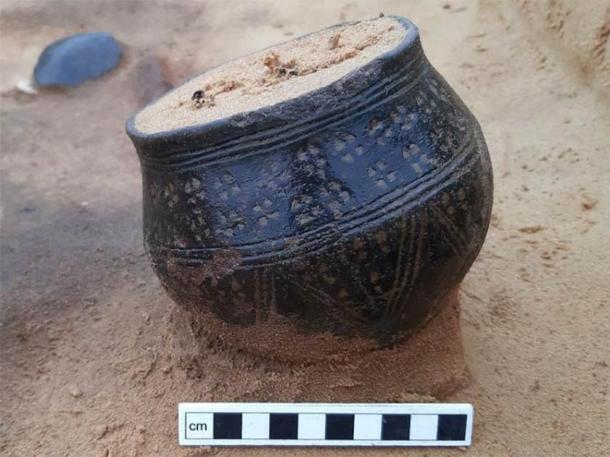 Many of the graves included fragments of pottery and decorated pots. (Suffolk County Council)