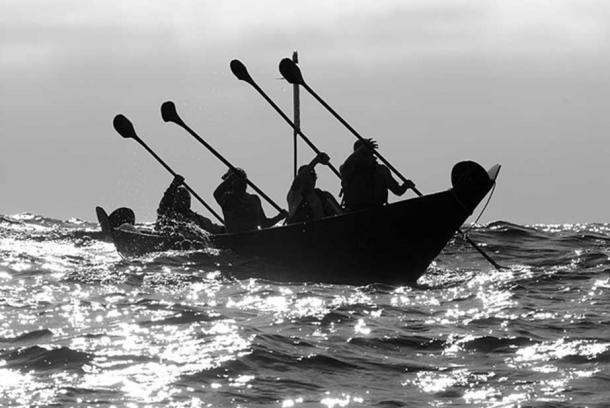 Chumash Tomol 'Elye'wun paddlers crossing at Santa Cruz Island. California, Channel Islands NMS, Santa Cruz Island. 