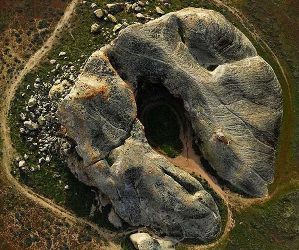 Aerial view of Painted Rock. The interior alcove of the horseshoe-shaped rock features pictographs by Chumash, neighboring tribes, and non-Native Americans. 
