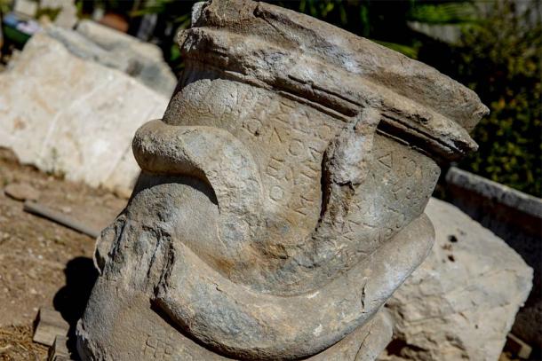 A closeup of the Greek snake altar recently found in Patara, Turkey showing the Greek writing on the altar more clearly. (AA)