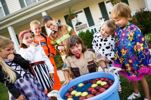 Apple bobbing is a Halloween party game you can still enjoy, as long as you keep it in the family