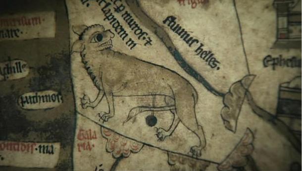 A lynx depicted on the Hereford Mappa Mundi, with sharp teeth and claws.