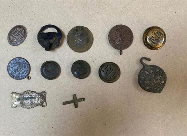 Decorative and jewelry historical artifacts, illicitly obtained, discovered in the suspect’s home in Poland. (KPP Wadowicach)