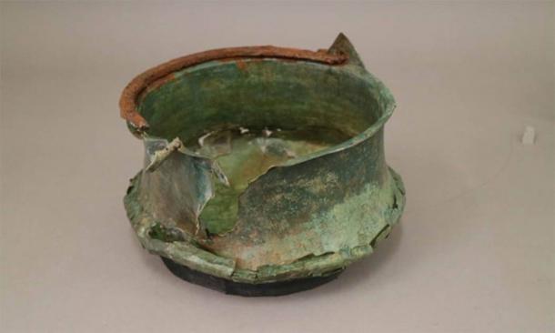 A copper vessel, one of the grave goods found in the Anglo-Saxon warrior grave. (University of Reading)